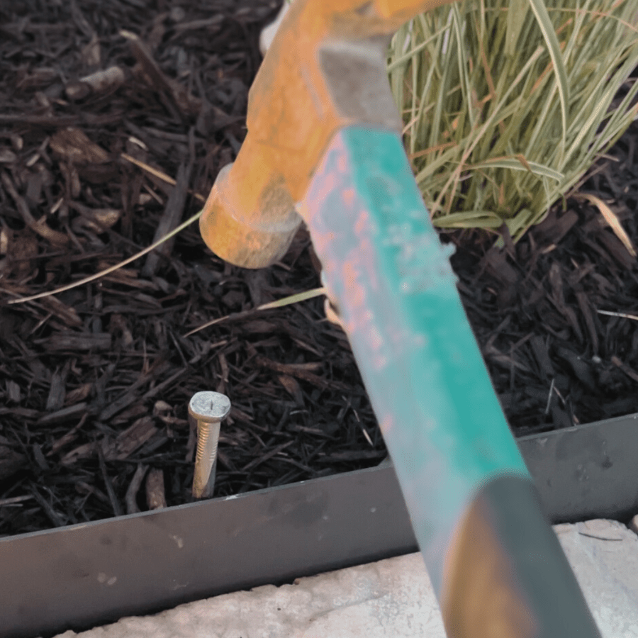 how to use the metal edging stakes for installing the edging. stainless steel nail with a spiral for strength. a blue hammer